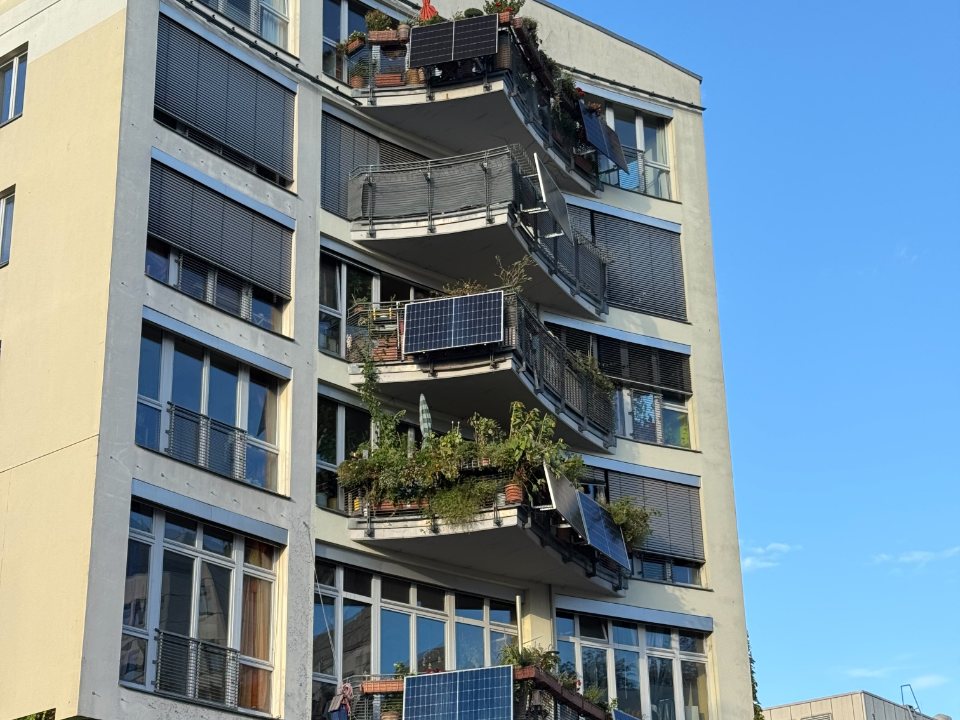 Plug-in solar panels fixed to the balconies of a block of flats
